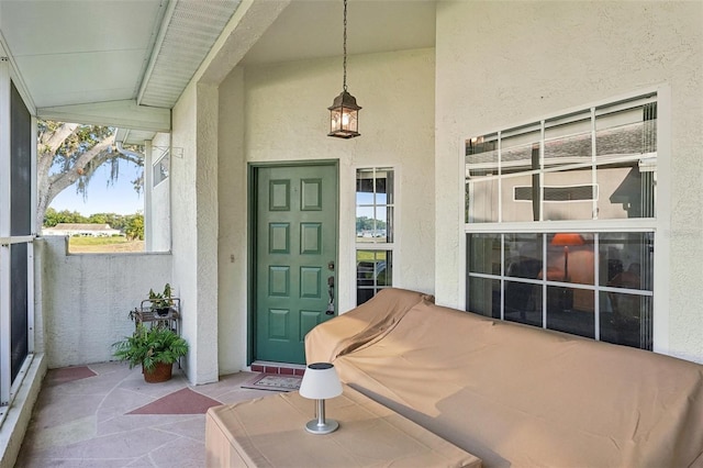 property entrance featuring a porch