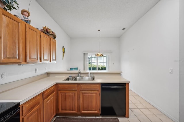 kitchen featuring sink, kitchen peninsula, decorative light fixtures, light tile patterned floors, and black appliances