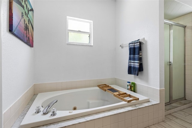 bathroom with shower with separate bathtub