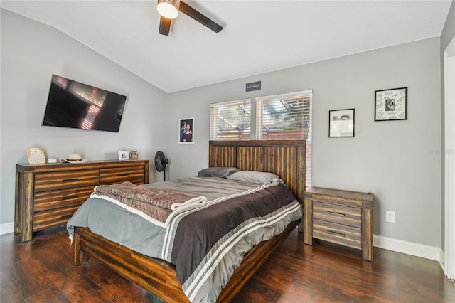 bedroom with ceiling fan, dark hardwood / wood-style flooring, and lofted ceiling