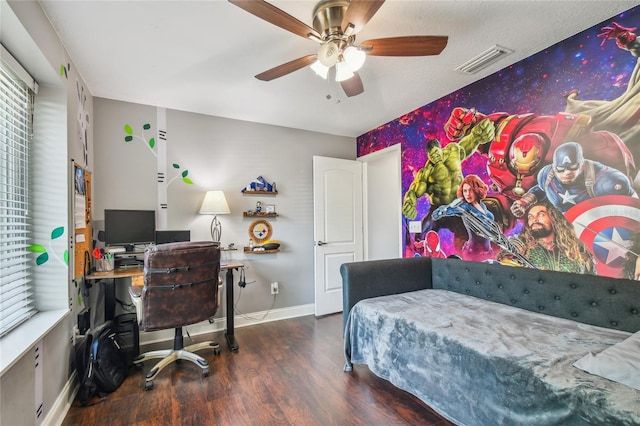 bedroom with ceiling fan and dark wood-type flooring