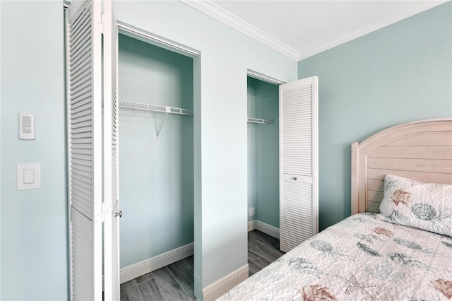 bedroom with crown molding and dark wood-type flooring