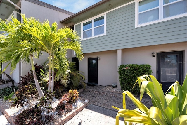 1028 Apollo Beach Blvd Unit 27, Apollo Beach, FL 33572 - entrance to property with stucco siding