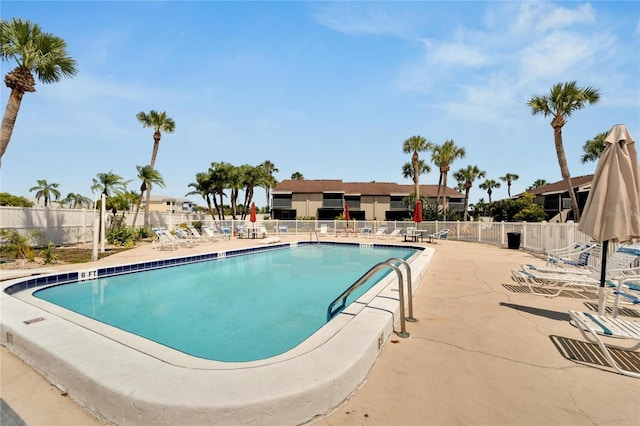 view of swimming pool with a patio