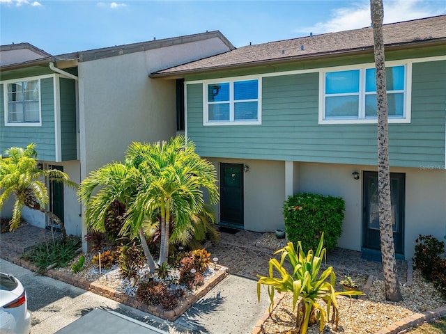 1028 Apollo Beach Blvd Unit 27, Apollo Beach, FL 33572 - view of front of home with stucco siding