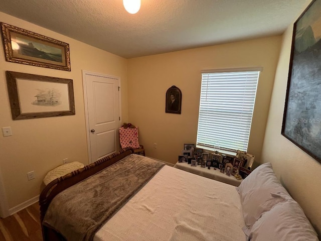 bedroom with a textured ceiling