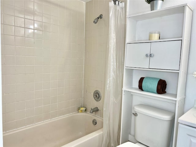 bathroom with shower / bath combo and toilet