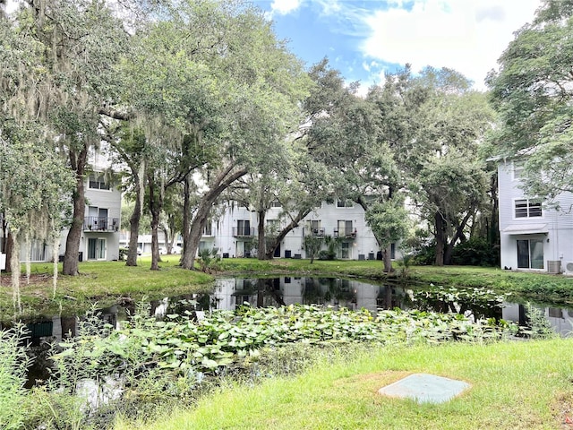 view of yard with a water view