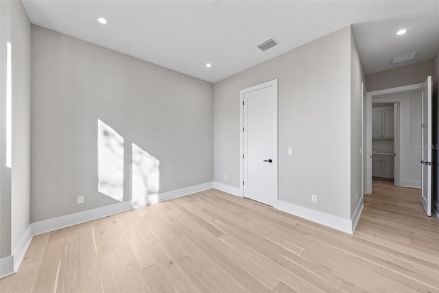 unfurnished bedroom featuring light hardwood / wood-style floors