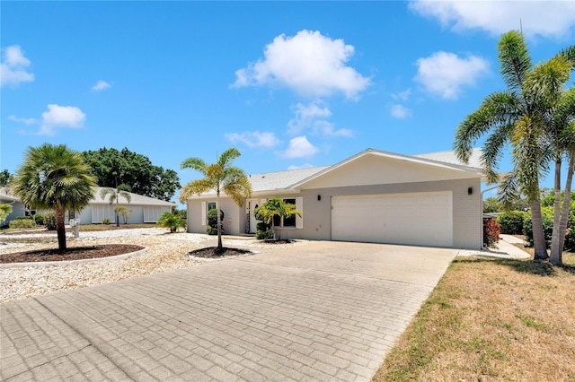 ranch-style home with a garage