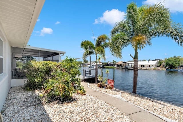 dock area with a water view