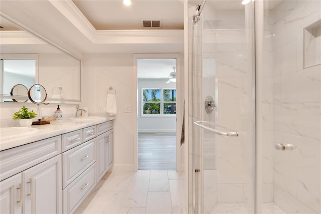 bathroom with vanity, wood-type flooring, a shower with door, and crown molding