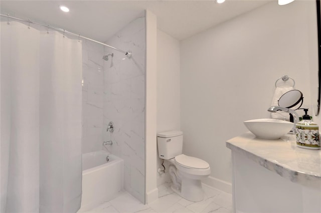 full bathroom with sink, shower / tub combo, and toilet