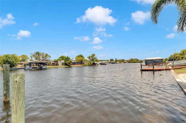 property view of water with a boat dock