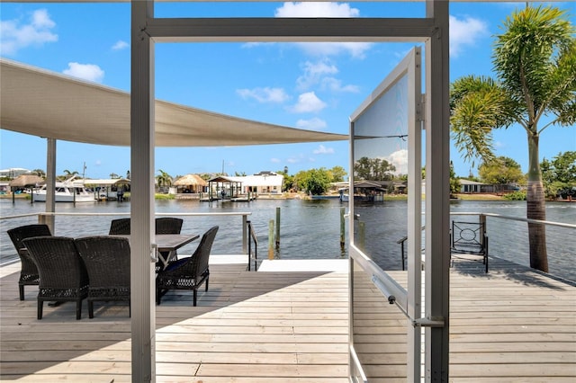 view of dock with a water view