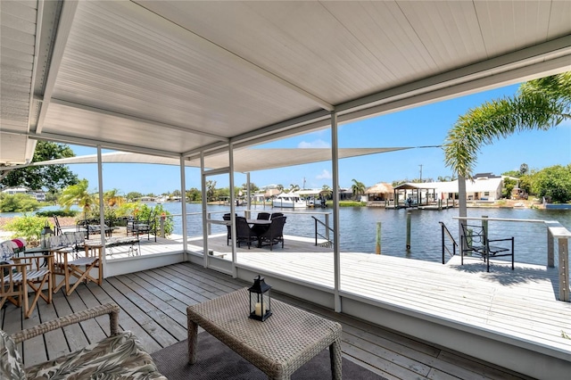 dock area with a water view