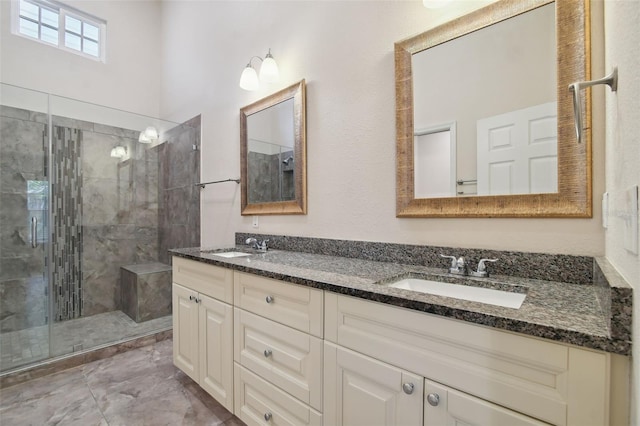 bathroom with vanity and walk in shower