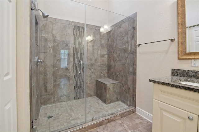 bathroom with vanity and an enclosed shower