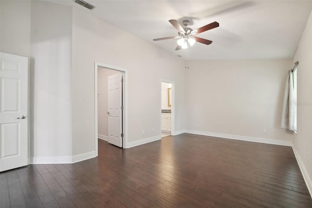 unfurnished room featuring ceiling fan, dark hardwood / wood-style flooring, and lofted ceiling