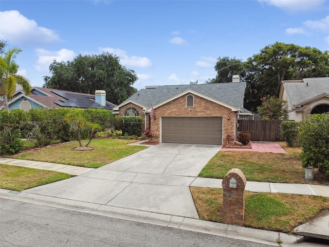 ranch-style house featuring a front lawn