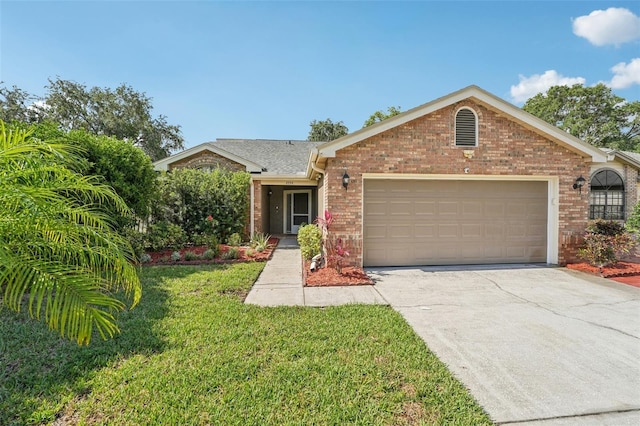 3554 Deer Run S, Palm Harbor, FL 34684 - ranch-style house with brick siding, a garage, concrete driveway, and a front lawn