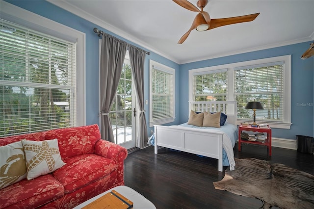 bedroom with multiple windows, ceiling fan, crown molding, and dark wood-type flooring