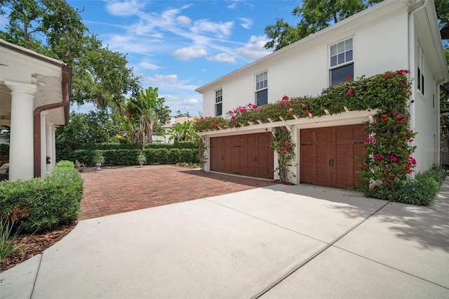 view of front of home with a garage