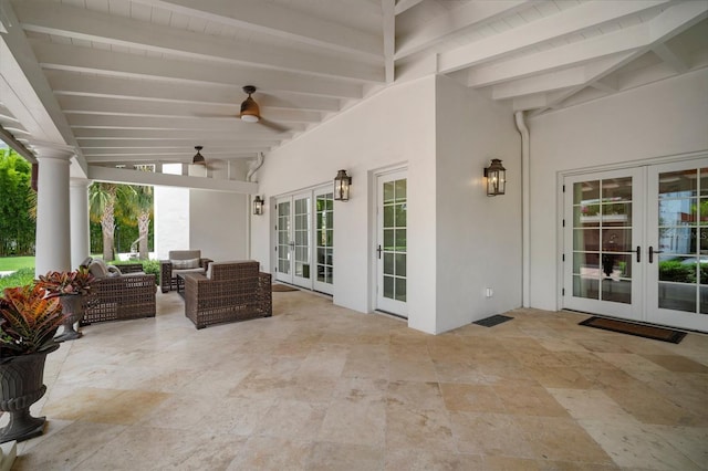 view of patio / terrace with french doors, an outdoor living space, and ceiling fan