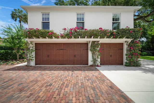 view of front of home featuring a garage