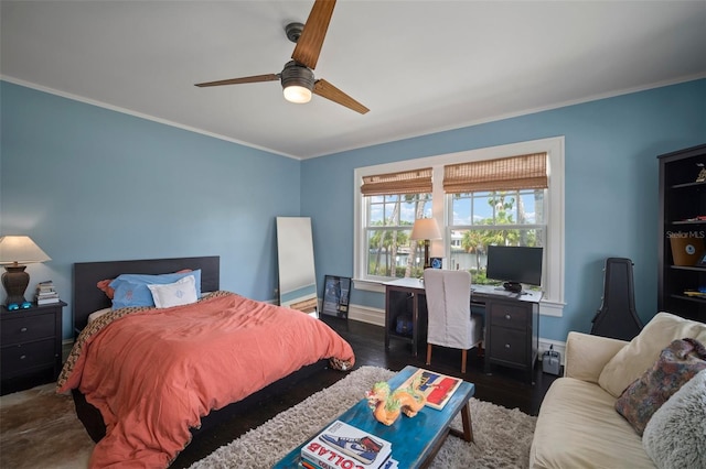 bedroom featuring ceiling fan, dark hardwood / wood-style flooring, and crown molding