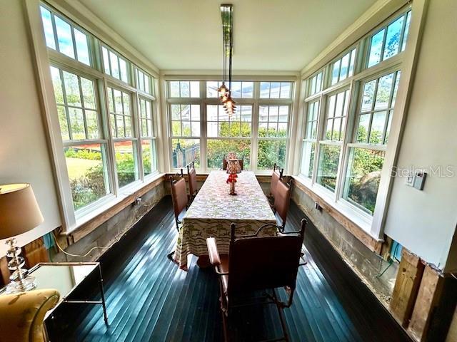 sunroom / solarium with a wealth of natural light