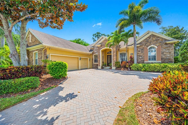 view of front of home with a garage