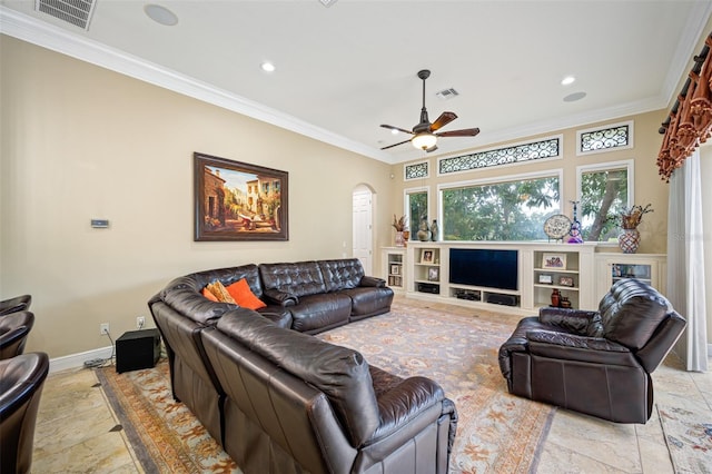 living room featuring ceiling fan and crown molding