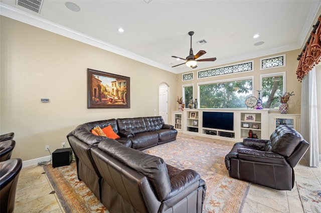 1227 Toscano Dr, Trinity, FL 34655 - living area featuring arched walkways, ornamental molding, recessed lighting, a ceiling fan, and baseboards