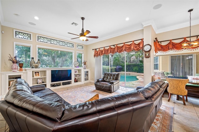 living room with ceiling fan and crown molding