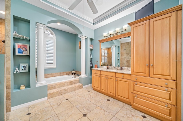 1227 Toscano Dr, Trinity, FL 34655 - full bath featuring ornate columns, a garden tub, ceiling fan, vanity, and ornamental molding