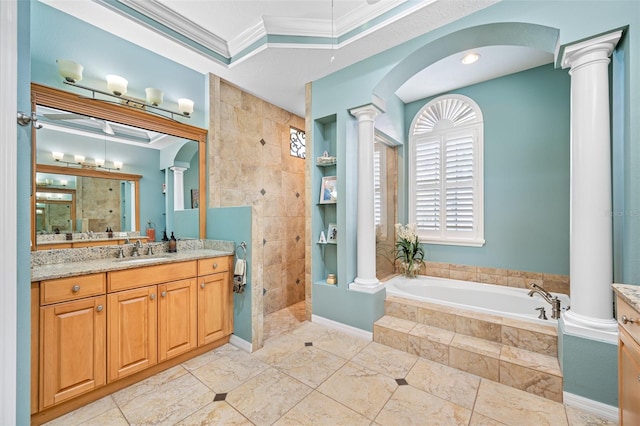 bathroom with vanity, ornamental molding, shower with separate bathtub, and decorative columns