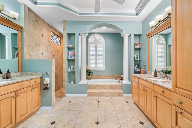 1227 Toscano Dr, Trinity, FL 34655 - full bathroom featuring ornate columns, healthy amount of natural light, a garden tub, two vanities, and ornamental molding