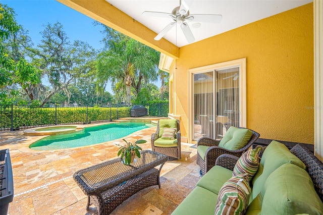 view of pool featuring an in ground hot tub, ceiling fan, a patio, and an outdoor living space