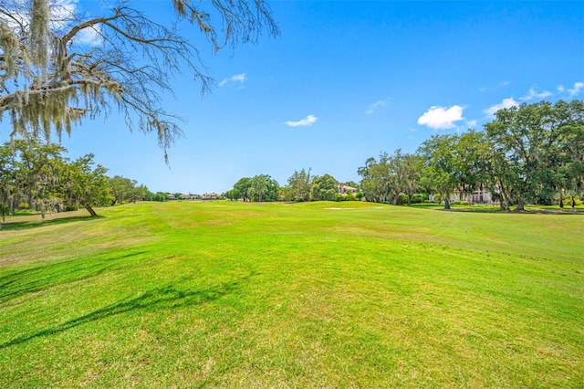 1227 Toscano Dr, Trinity, FL 34655 - view of community with golf course view and a yard