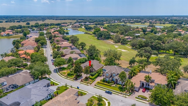 1227 Toscano Dr, Trinity, FL 34655 - aerial view of residential area featuring a large body of water and a golf club