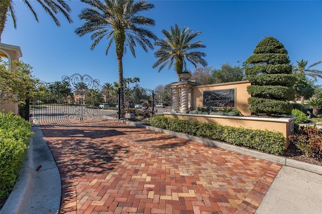 1227 Toscano Dr, Trinity, FL 34655 - community sign with a gate