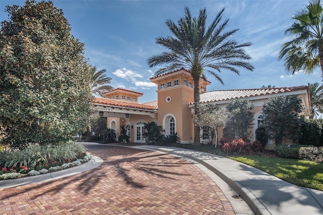 1227 Toscano Dr, Trinity, FL 34655 - view of property featuring curved driveway