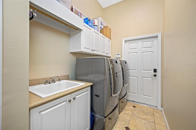 1227 Toscano Dr, Trinity, FL 34655 - washroom with washing machine and dryer, cabinet space, and baseboards