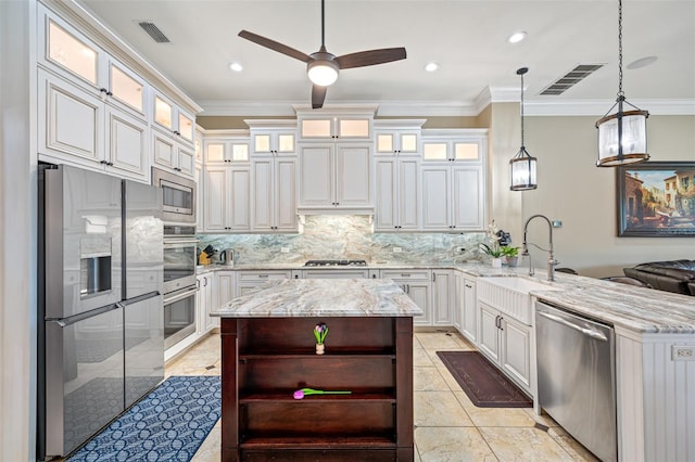 1227 Toscano Dr, Trinity, FL 34655 - kitchen with stainless steel appliances, a sink, open shelves, a peninsula, and ornamental molding