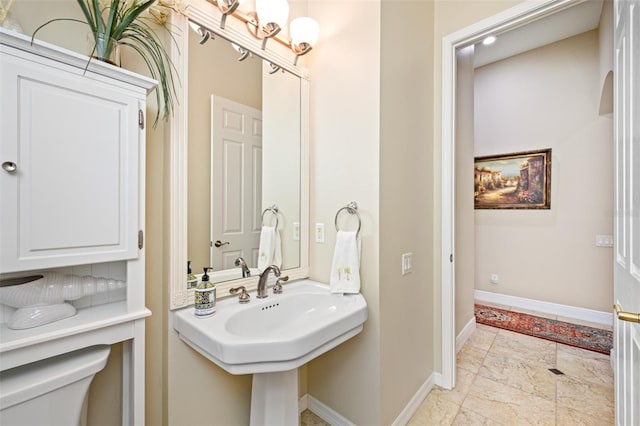 1227 Toscano Dr, Trinity, FL 34655 - bathroom featuring baseboards