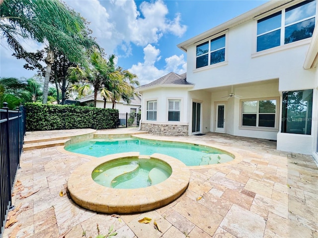 1227 Toscano Dr, Trinity, FL 34655 - view of swimming pool with a fenced backyard, a patio, a pool with connected hot tub, and ceiling fan