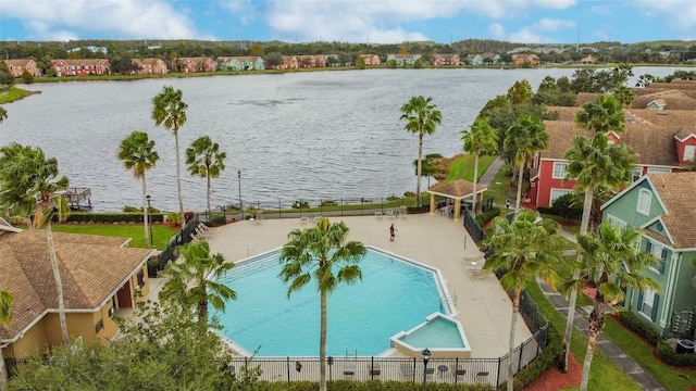 view of pool featuring a water view