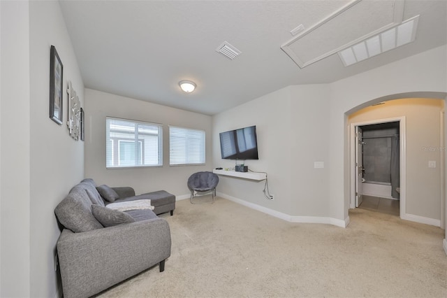 living area featuring light colored carpet