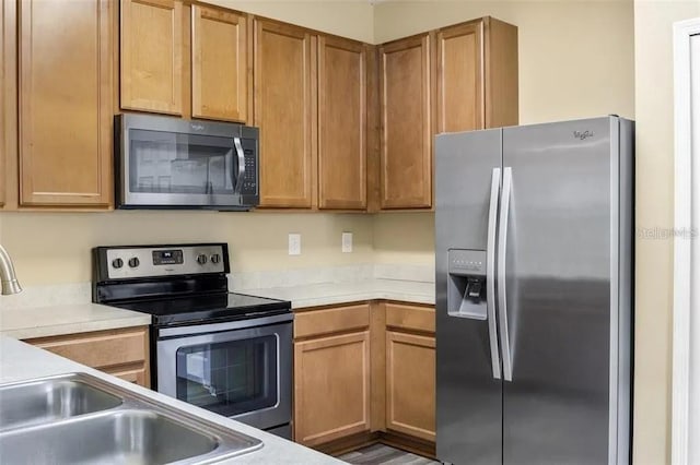 kitchen featuring sink and appliances with stainless steel finishes